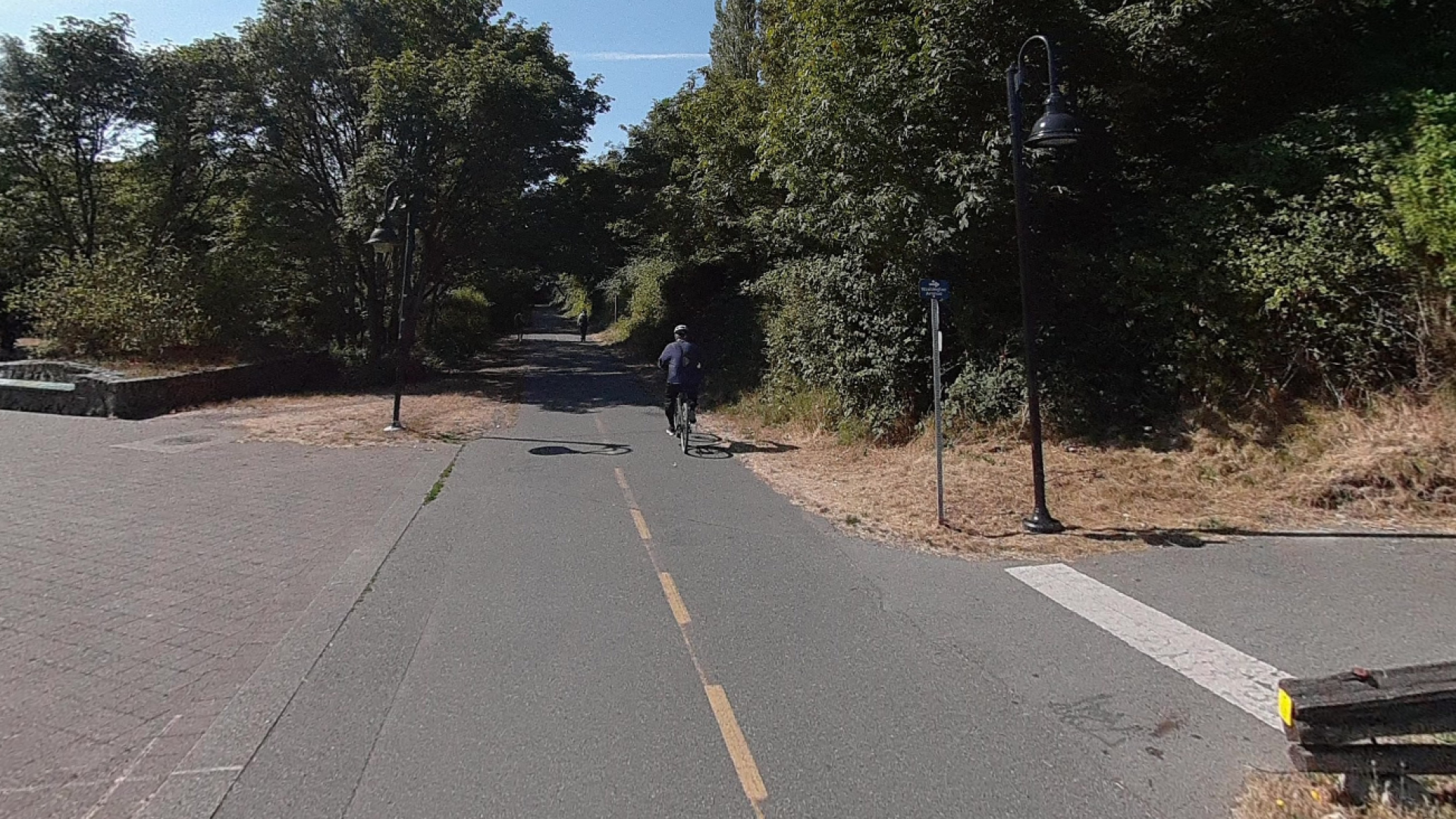 Cyclist travelling down the Galloping Goose in Cecelia Ravine.